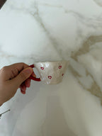 Red handle mug